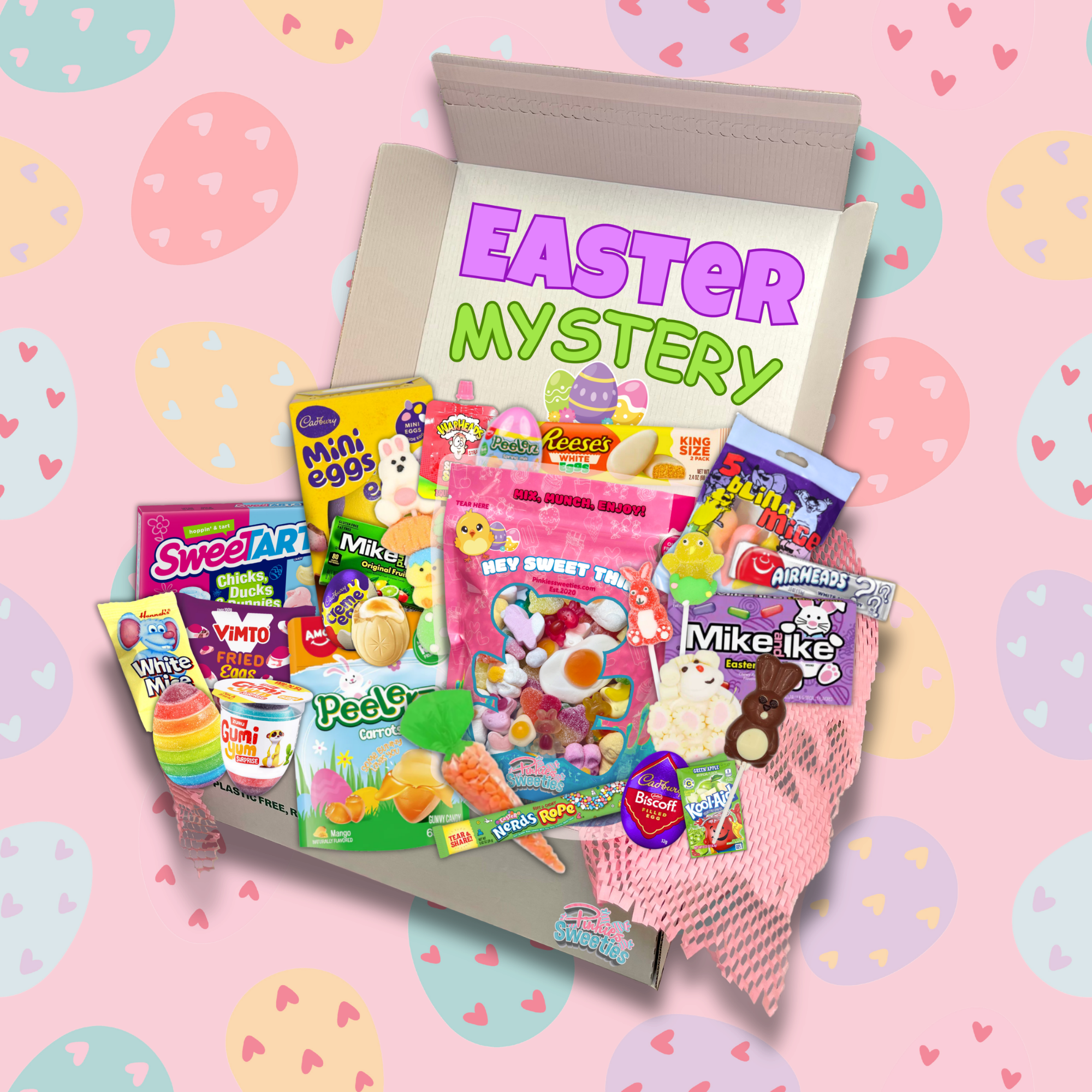Easter mystery box with candy packages on a pink background with Easter patterns. Easter seasonal sweets ll placed in a box